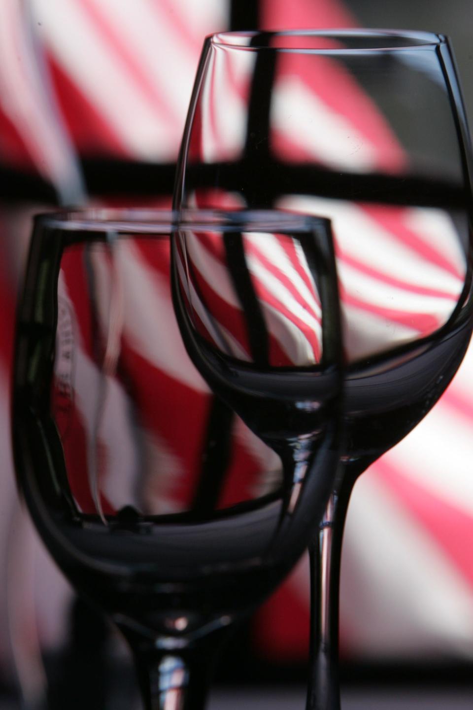 Glasses on a dining table against a window at the White Horse Tavern. which has been on the Wine Spectator list since 2013.