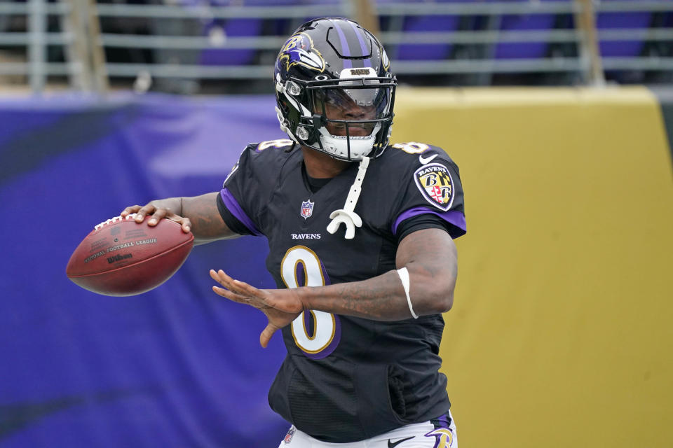 Nov 22, 2020; Baltimore, Maryland, USA; Baltimore Ravens quarterback <a class="link " href="https://sports.yahoo.com/nfl/players/31002" data-i13n="sec:content-canvas;subsec:anchor_text;elm:context_link" data-ylk="slk:Lamar Jackson;sec:content-canvas;subsec:anchor_text;elm:context_link;itc:0">Lamar Jackson</a> (8) warms up prior to the game against the Tennessee Titans at M&T Bank Stadium. Mandatory Credit: Mitch Stringer-USA TODAY Sports