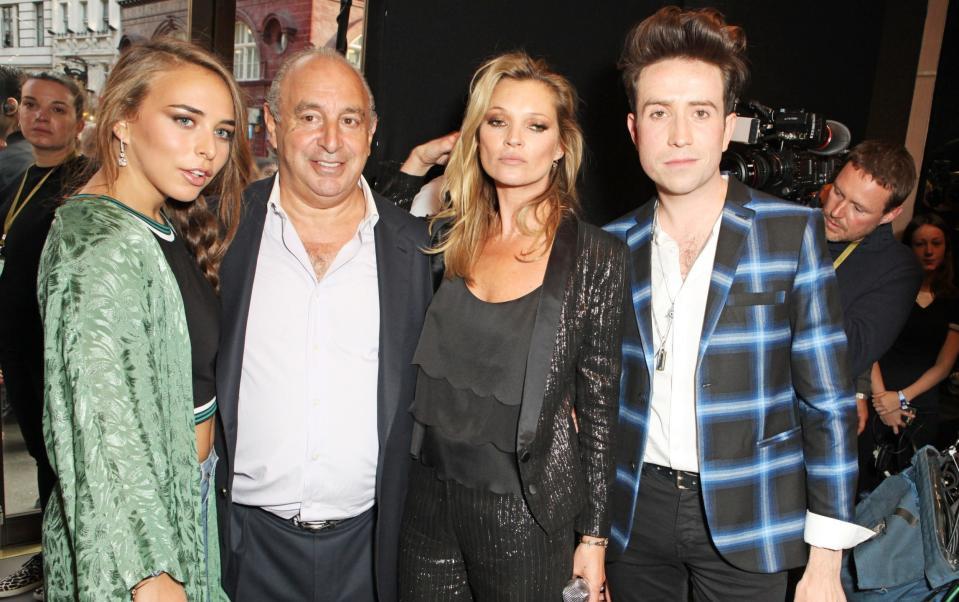 Chloe Green, Philip Green, Kate Moss and Nick Grimshaw at the VIP preview of the Kate Moss For TopShop collection in 2014 - David M. Benett