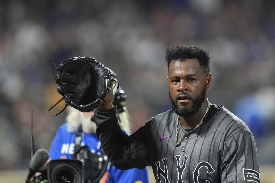 New York Mets pitcher Luis Severino gestures to fans as he leaves during the eighth inning of a baseball game against the Chicago Cubs, Monday, April 29, 2024, in New York. (AP Photo/Frank Franklin II)