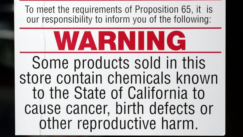 Prop 65 warning posted on the window of a Ventura auto parts store. There are signs required by law on the outside of the store. - Photo: Stephen Osman/Los Angeles Times (Getty Images)