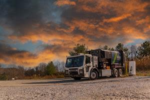 Casella's Mack LR Electric charging at sunset