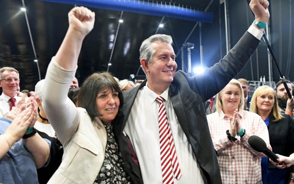 Mr Poots celebrates his election victory in South Belfast