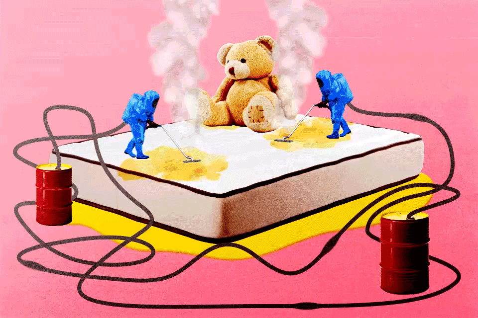 A photo illustration shows two miniature workers in hazmat suits steam cleaning a mattress as a teddy bear sits on it nearby.