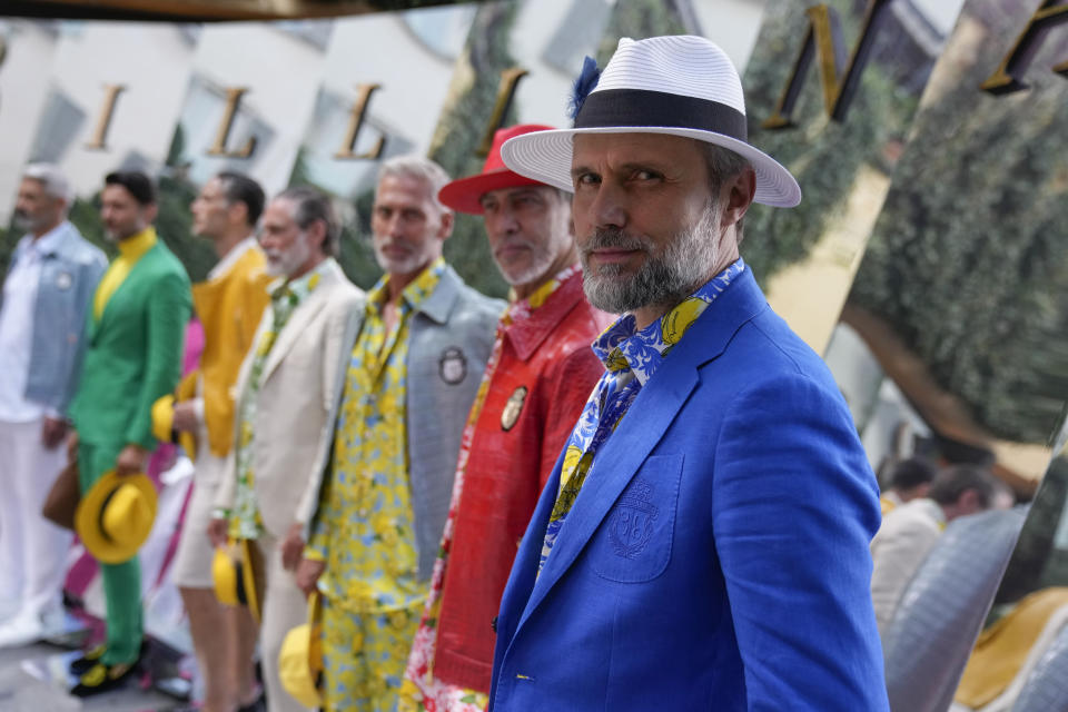 Model wear creations as part of the Billionaire men's Spring Summer 2023 collection presented in Milan, Italy, Friday, June 17, 2022. (AP Photo/Luca Bruno)