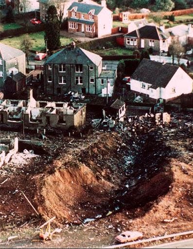This December 1988 file photo shows wrecked houses and a deep gash in the ground in the village of Lockerbie, Scotland, that was caused by the crash of Pan Am Flight 103. In 1988, 270 people were killed when a terrorist bomb exploded aboard a Pam Am Boeing 747 over Lockerbie, Scotland, sending wreckage crashing to the ground. The 30th anniversary of the bombing was being marked Dec. 21, 2018, with services in Scotland and the United States.