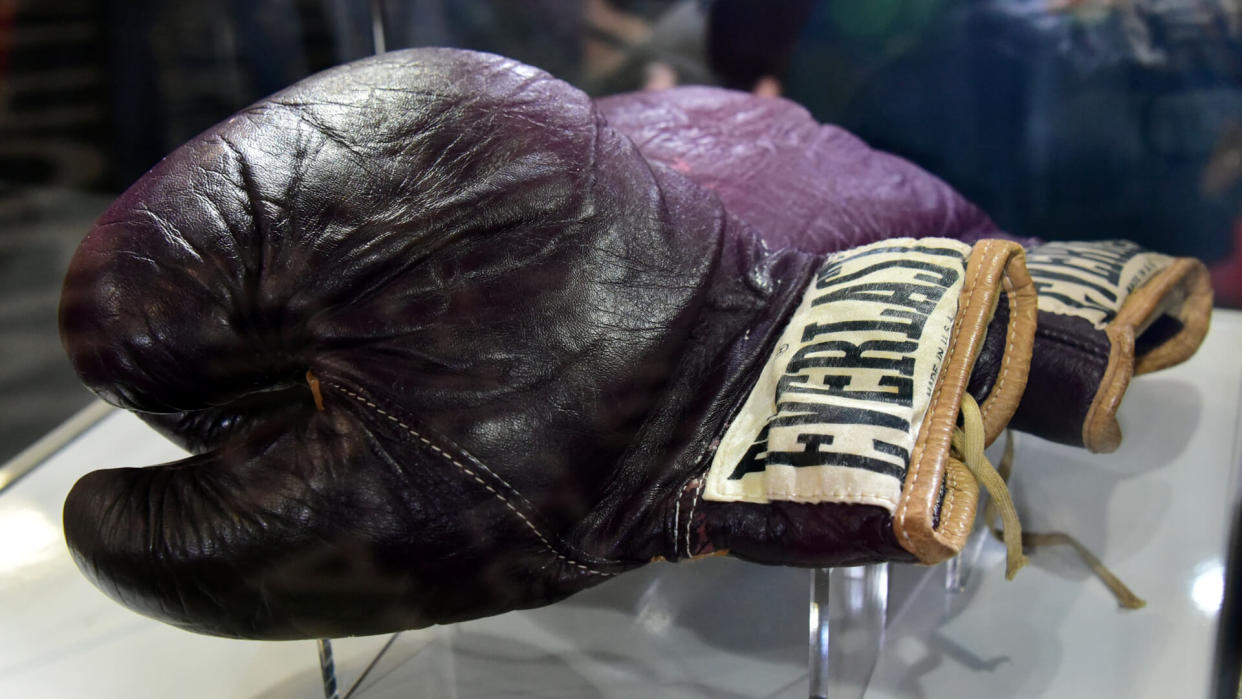 Mandatory Credit: Photo by Nils Jorgensen/Shutterstock (5609258l)Muhammad Ali's gloves used to fight Joe Frazier at Madison Square Garden 1971'I Am The Greatest: Muhammad Ali' exhibition at the O2, London, Britain - 03 Mar 2016Press view of exhibition featuring more than 100 artefacts from the boxer's career, put together with the help of the Ali family, showcased to celebrate the life of the former heavyweight champion giving an insight into one of the sport's most famous personalities.