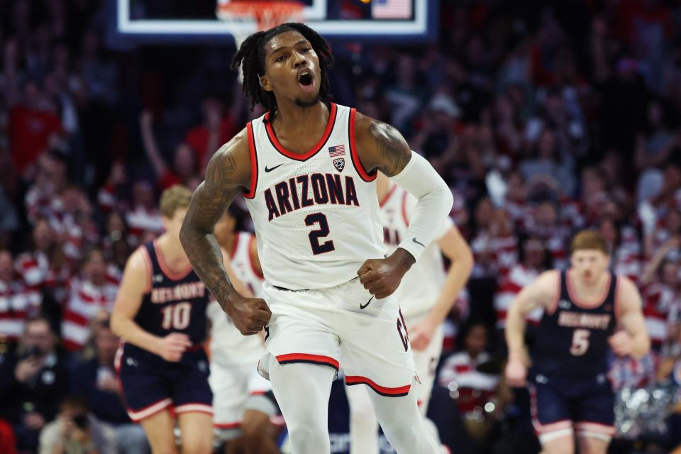 Arizona Wildcats guard Caleb Love (2) celebrates a basket against the Belmont Bruins during the first half at McKale Center.