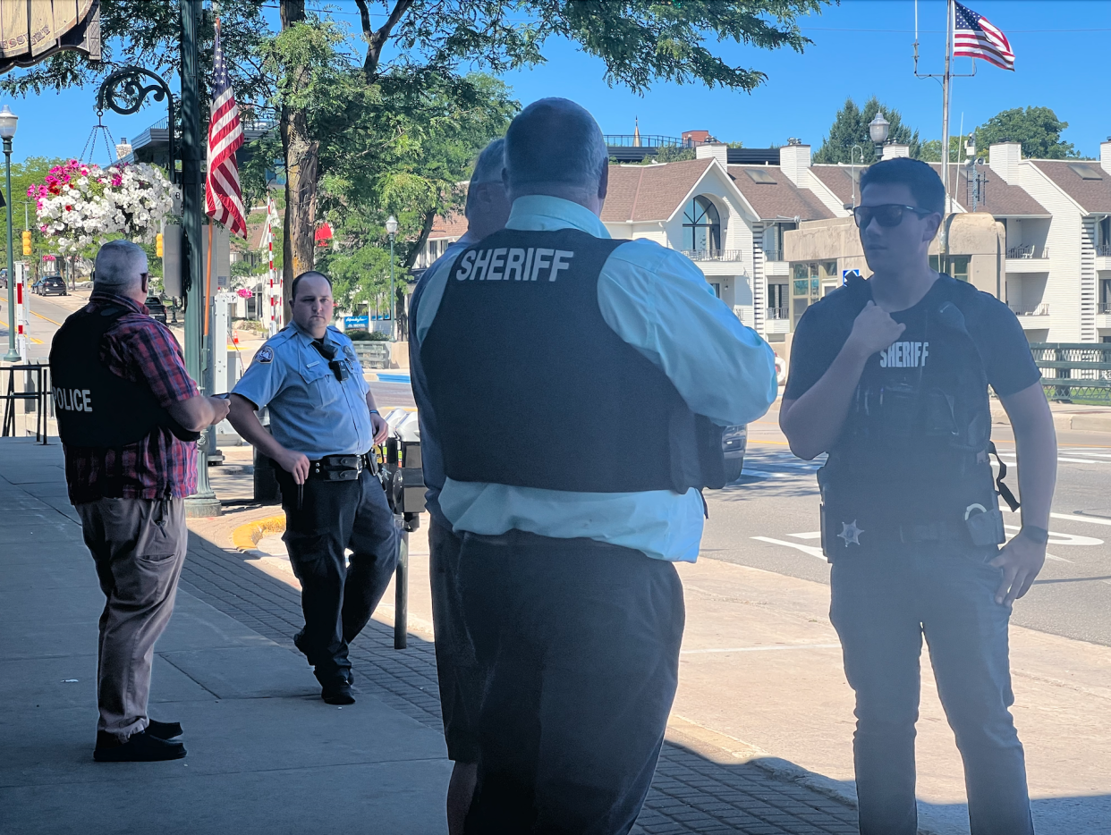 Law enforcement officials respond to a bomb threat in downtown Charlevoix on Thursday afternoon.