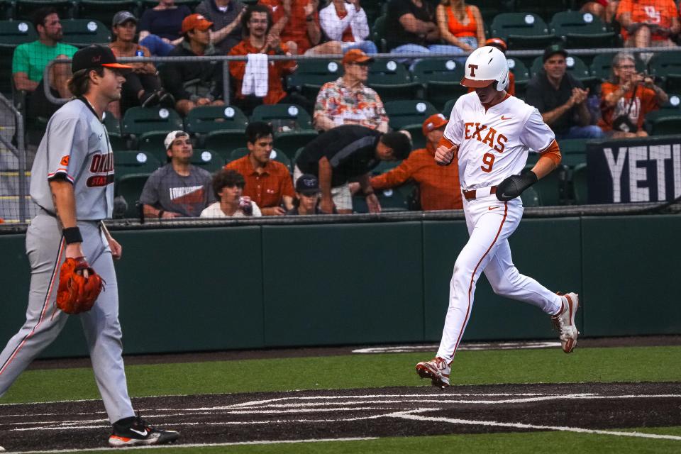 "I've never liked them personally, just growing up being a UT fan," Texas Longhorns infielder Jared Thomas said of the Texas A&M Aggies. Texas is headed to College Station for an NCAA Tournament regional.