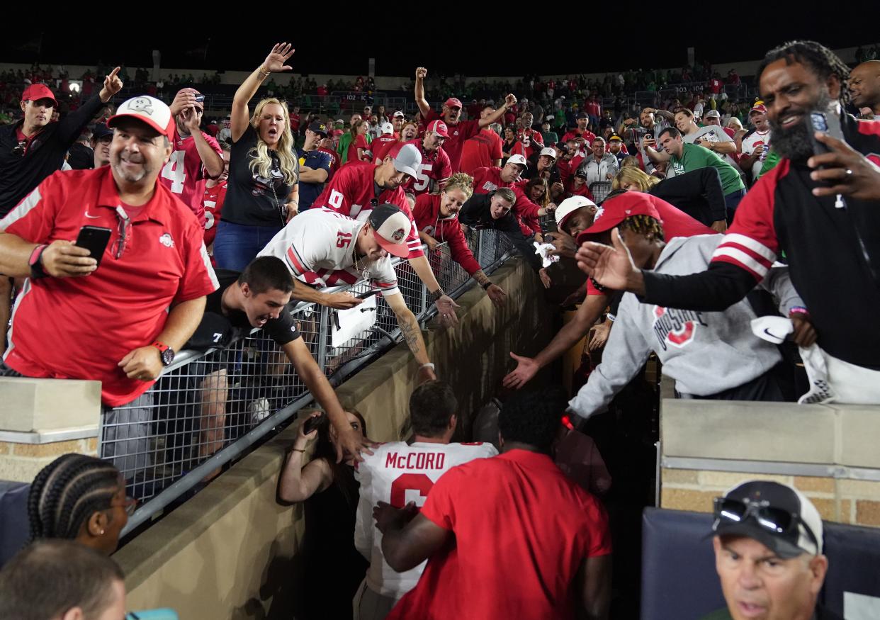 Ohio State quarterback Kyle McCord walks off the field after beating Notre Dame on Saturday.