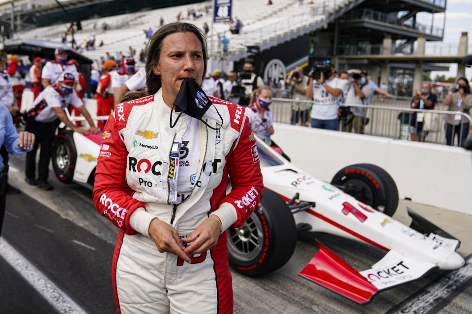 Simona De Silvestro, of Switzerland, stand next to her car after failing to break into a guaranteed spot in the race during qualifications for the Indianapolis 500 auto race at Indianapolis Motor Speedway in Indianapolis, Saturday, May 22, 2021. (AP Photo/Michael Conroy)