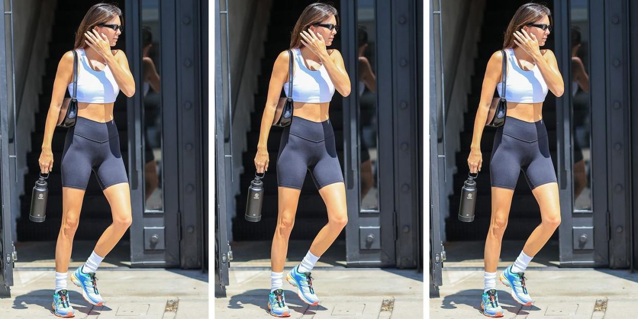 kendall jenner wears a pair of alo yoga biker shorts in a roundup of the best biker shorts for women 2023