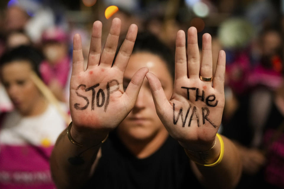 People protest against Israeli Prime Minister Benjamin Netanyahu's government and call for the release of hostages held in the Gaza Strip by the Hamas militant group, in Tel Aviv, Israel, Saturday, June 29, 2024. (AP Photo/Ohad Zwigenberg)