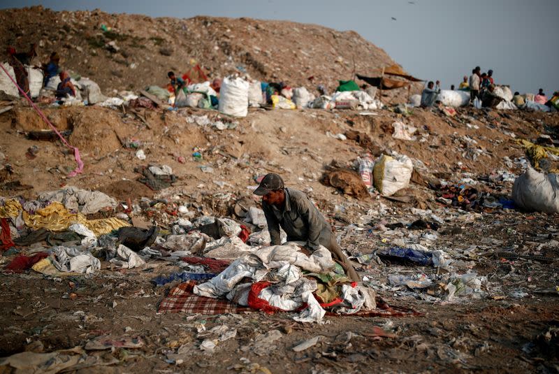 The Wider Image: "Fear will not fill our bellies": why Indian scavengers risk their lives amid coronavirus debris