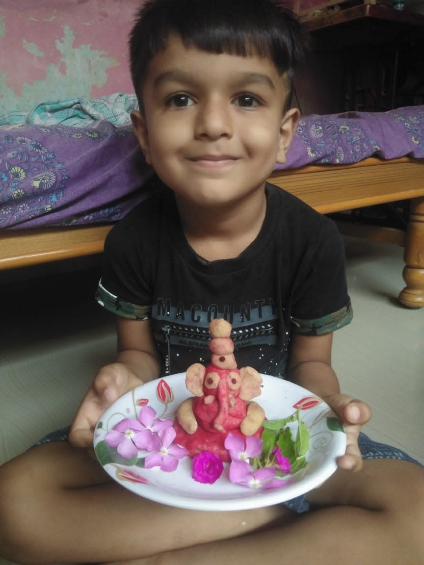 Priyanka Barot shares a picture of Poorv Barot holding the homemade colourful Ganesha.