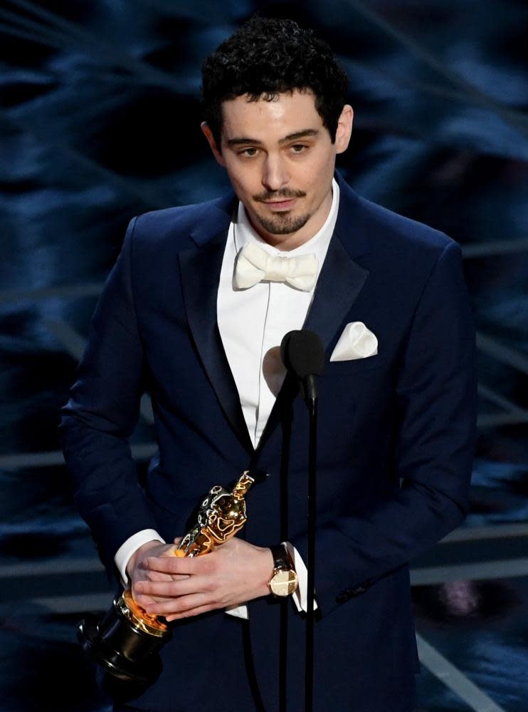 Damien Chazelle accepts the best director Oscar for La La Land in 2017.