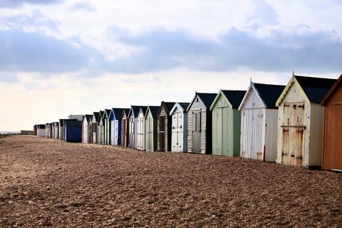 Colourful beach huts in Felixstowe - Credit: getty