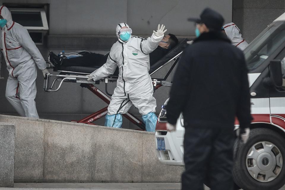 Medical staff transfer patients to Jin Yintan hospital in Wuhan, China, on Jan. 17, 2020. Wuhan is the province where the novel coronavirus originated.