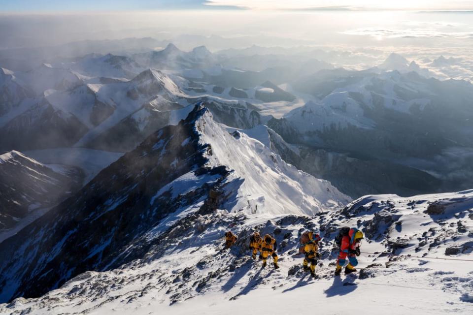 <div class="inline-image__caption"><p>Team members during the expedition to find Sandy Irvine's remains on Mt. Everest, in attempt to solve one of the mountain's greatest mysteries: who was the first to summit Mt. Everest? </p></div> <div class="inline-image__credit">National Geographic/Matt Irving</div>