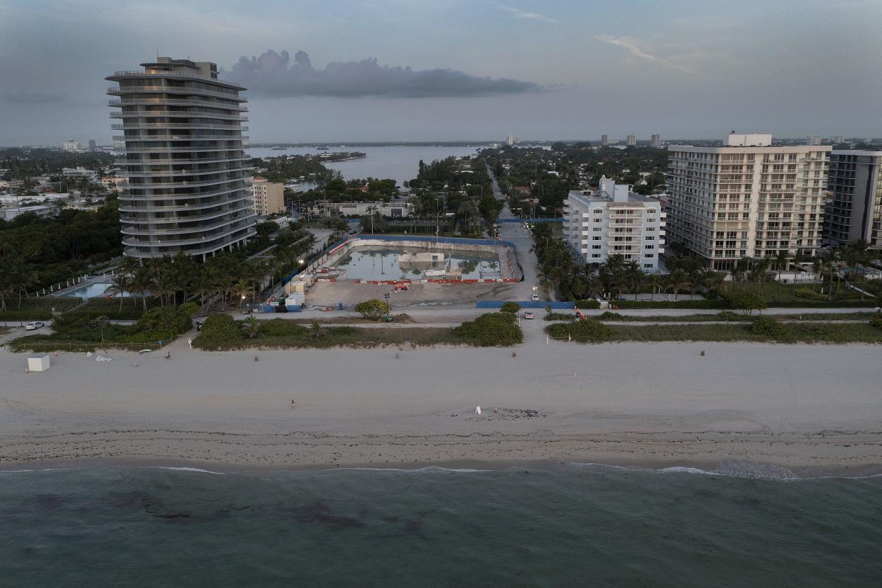 In this aerial view, the cleared lot that was where the collapsed 12-story Champlain Towers South condo building once stood on July 31 in Surfside, Florida. 