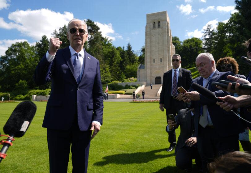 U.S. President Joe Biden speaks to the press as he attends a wreath laying ceremony at the Aisne-Marne American World War One Cemetery in Belleau, France, Sunday, June 9, 2024. (AP Photo/Evan Vucci)