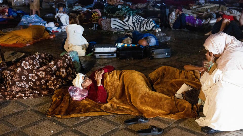 Residents of Marrakech stay out at a square after the earthquake struck the region on Friday night. - Fadel Senna/AFP/Getty Images