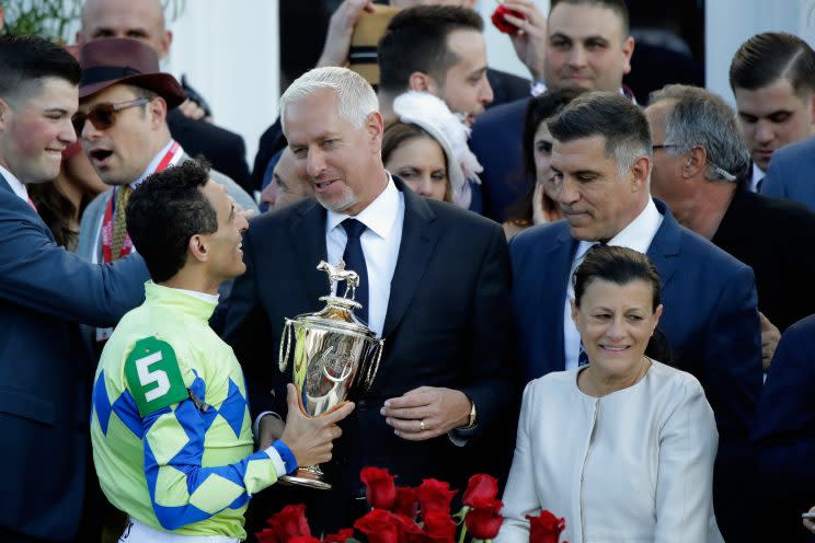 Trainer Todd Pletcher (C) celebrates with jockey John Velazquez (L) after Always Dreaming won the 143rd running of the Kentucky Derby. (Getty)