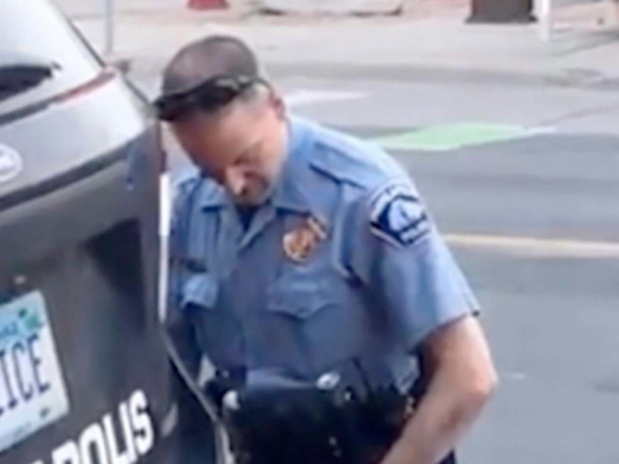 Minneapolis Police Officer Derek Chauvin kneels on the neck of George Floyd: AP