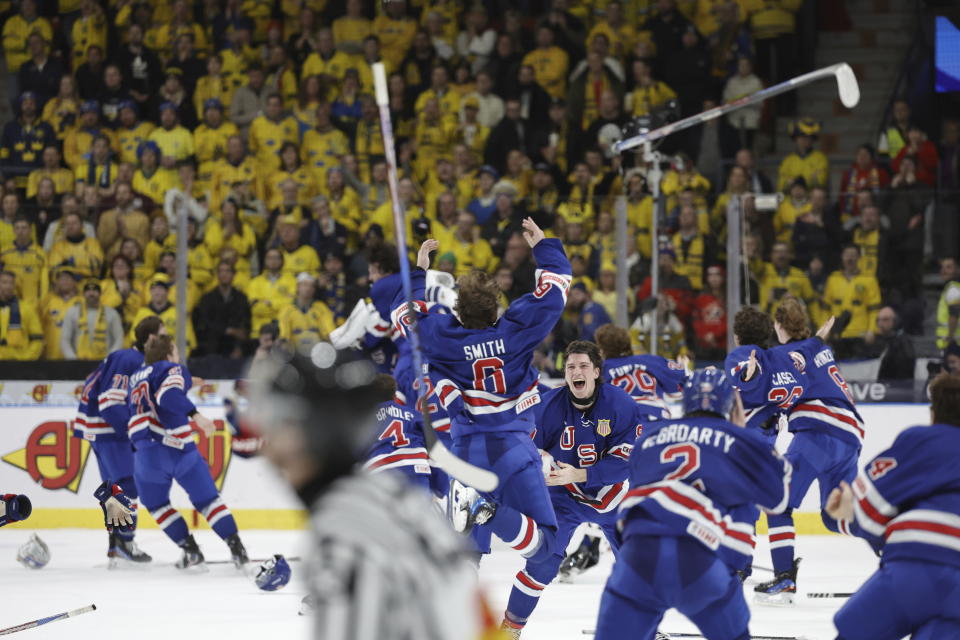 USA players celebrate winning the IIHF World Junior Championship ice hockey final match between Sweden and USA at Scandinavium in Gothenburg, Sweden, Friday Jan. 5, 2024. (Bjorn Larsson Rosvall/TT via AP)