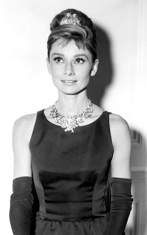 Audrey Hepburn wearing the Tiffany yellow diamond - Credit: &nbsp;Getty Images