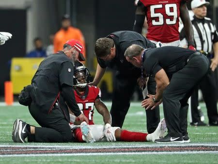 Sep 23, 2018; Atlanta, GA, USA; Atlanta Falcons cornerback Ricardo Allen (37) is looked at by trainers after getting injured in overtime against the New Orleans Saints at Mercedes-Benz Stadium. Mandatory Credit: Jason Getz-USA TODAY Sports