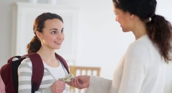 C4WD2P USA, New Jersey, Jersey City, Mother giving money to teenage daughter (14-15). Image shot 2011. Exact date unknown.  stan