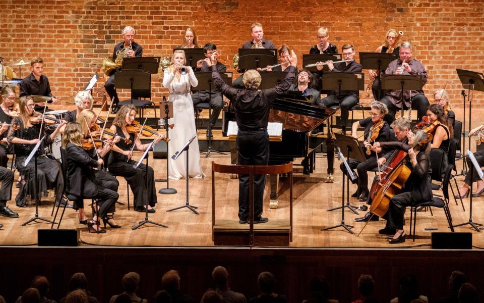 Top-class musicians: English trumpeter Alison Balsom playing with the Britten Sinfonia at Snape Maltings Concert Hall - Tom Lovatt
