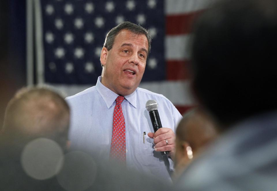 New Jersey Gov. Chris Christie addresses a gathering during a town hall meeting in Brick Township, N.J., Thursday, April 24, 2014. (AP Photo/Mel Evans)