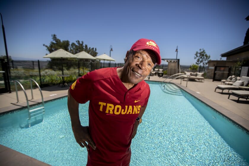 Aliso Viejo, CA - June 29: USC Heisman winner Charles White shows his Trojan spirit but is suffering from level 2 dementia and living in a memory care center, where he always wears USC gear. He struggles to keep up with in-depth conversations. His family has provided his care after he fell on hard times and has had no contact from the university in recent years. Photo taken in Belmont Village Senior Living home, Aliso Viejo Wednesday, June 29, 2022. (Allen J. Schaben / Los Angeles Times)