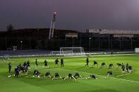 River Plate players warm up during a training session in Madrid, Spain, Thursday, Dec. 6, 2018. The Copa Libertadores Final will be played on Dec. 9 in Spain at Real Madrid's stadium for security reasons after River Plate fans last Saturday attacked the Boca Junior team bus heading into the Buenos Aires stadium for the meeting of Argentina's fiercest soccer rivals. (AP Photo/Andrea Comas)