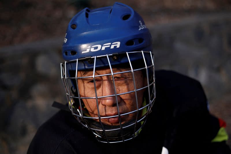 The Wider Image: On a frozen pond far from the Olympics, meet China's ice hockey veterans