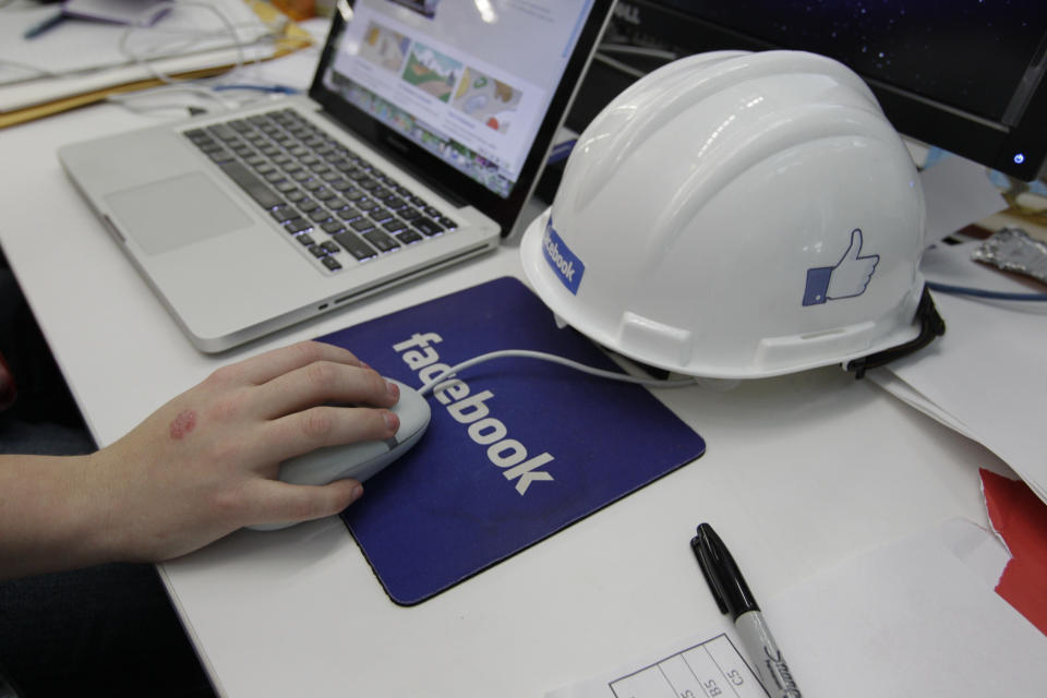 In this Feb. 8, 2012 photo shows inside view of Facebook headquarters in Menlo Park, Calif. (AP Photo/Paul Sakuma)