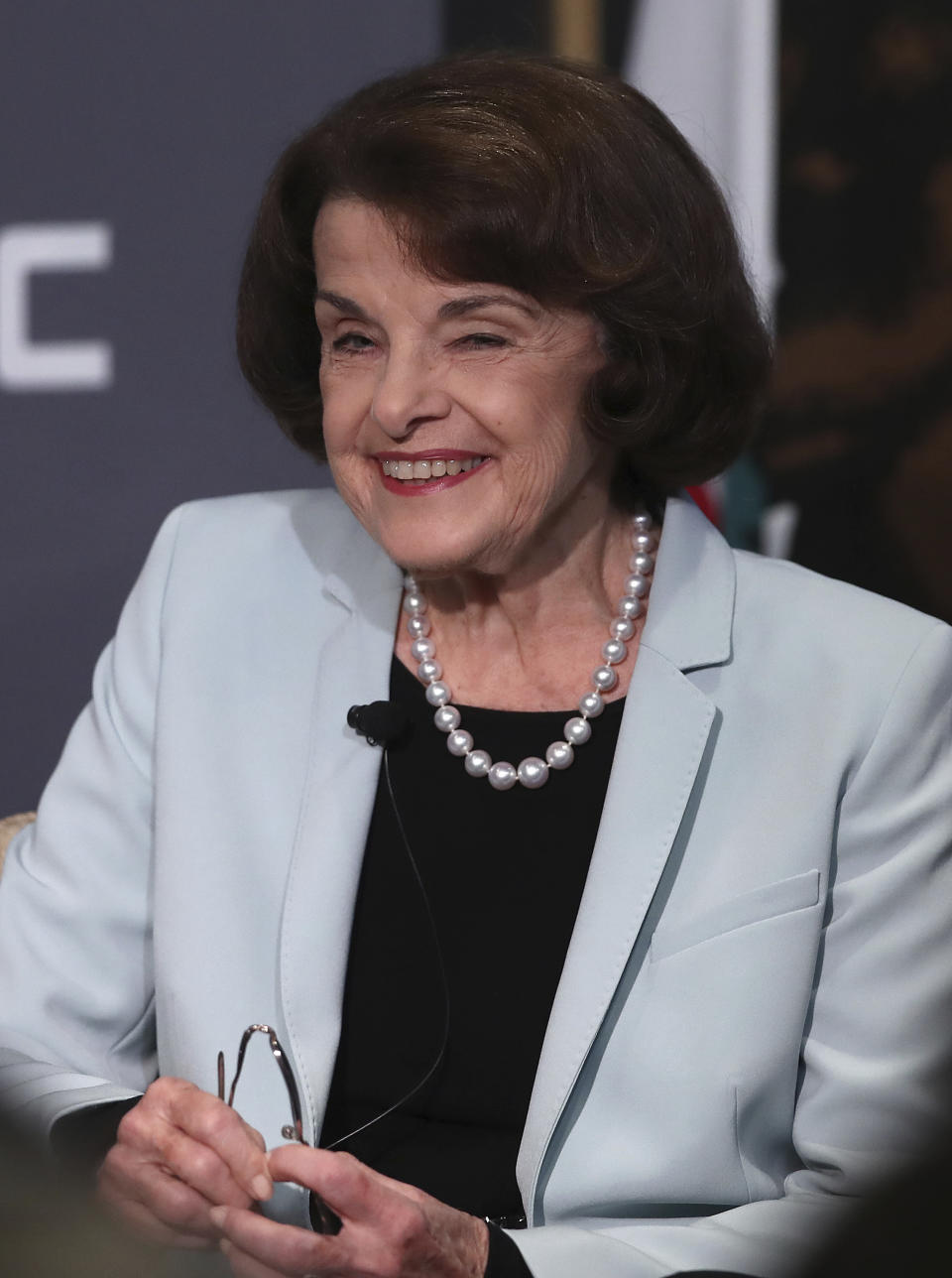 California Sen. Dianne Feinstein, D-Calif., smiles while speaking to California Sen. Kevin de Leon, D-Los Angeles, during a debate on Wednesday, Oct. 17, 2018, in San Francisco. Feinstein shared the stage with an opponent for the first time since 2000 when she debated state Sen. Kevin de Leon.The two Democrats are facing off in the Nov. 6 election. (AP Photo/Ben Margot)