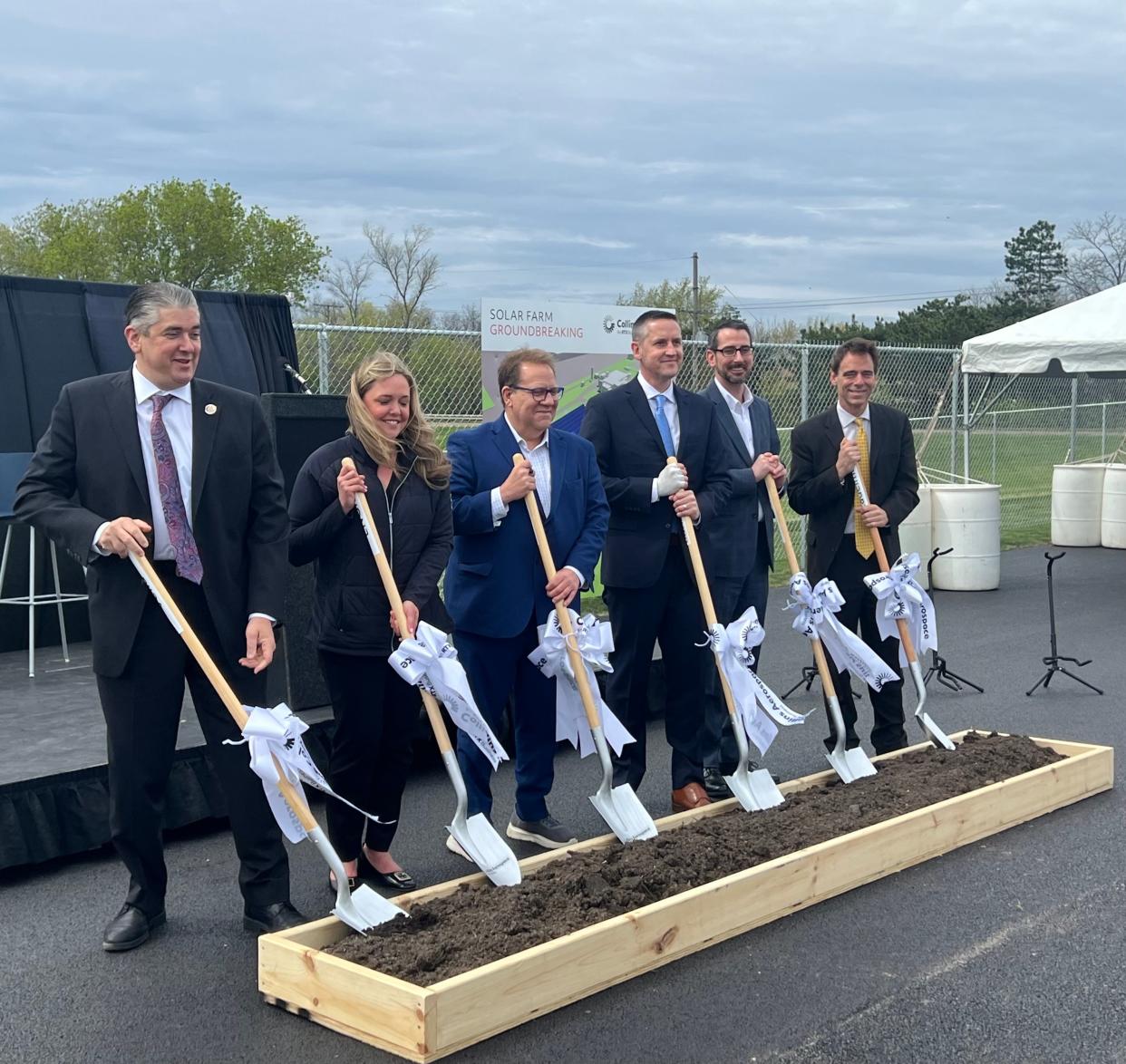 State Rep. Dave Vella, from left, Kristen Fornes of ENGIE North America, Rockford Ald. Mark Bonne, Eric Cunningham of Collins Aerospace, Rockford Mayor Tom McNamara and State Sen. Steve Stadelman participate in a solar farm groundbreaking ceremony Friday, April 26, 2024, at Collins Aerospace in Rockford.