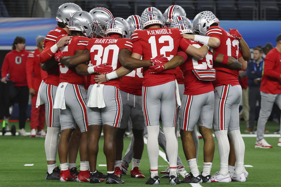 Ohio State players gather before the Cotton Bowl NCAA college football game against Missouri on Friday, Dec. 29, 2023, in Arlington, Texas. (AP Photo/Richard W. Rodriguez)