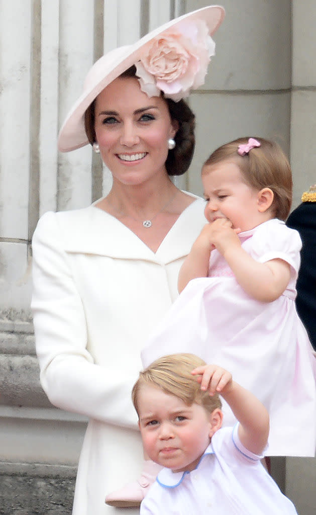 Kate Middleton is a fan of hand-me-downs, letting Princess Charlotte wear big brother Prince George's clothes. (Getty Images)