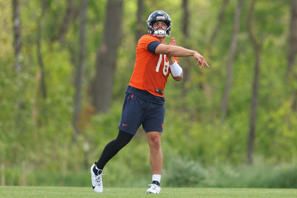 LAKE FOREST, ILLINOIS - MAY 11: Caleb Williams #18 of the Chicago Bears throws a pass during Chicago Bears Rookie Minicamp at Halas Hall on May 11, 2024 in Lake Forest, Illinois. (Photo by Michael Reaves/Getty Images)