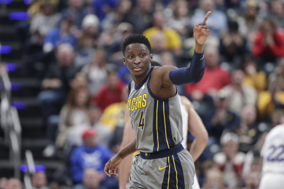 Indiana Pacers guard Victor Oladipo signals a 3-point basket against the Philadelphia 76ers during the first half of an NBA basketball game in Indianapolis, Thursday, Jan. 17, 2019. (AP Photo/Michael Conroy)