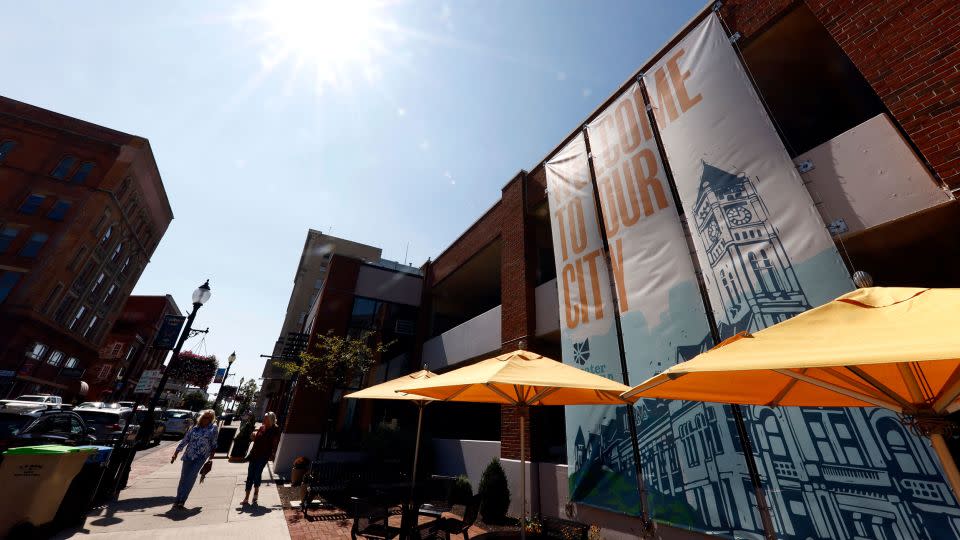 Pedestrians walk down Fountain Avenue in Springfield, Ohio, on Wednesday, September 11. - Paul Vernon/AP