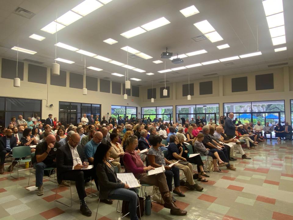 Attendees pack a room at Santa Fe College for the Alachua County Legislative Delegation hearing on Oct. 25, 2023.