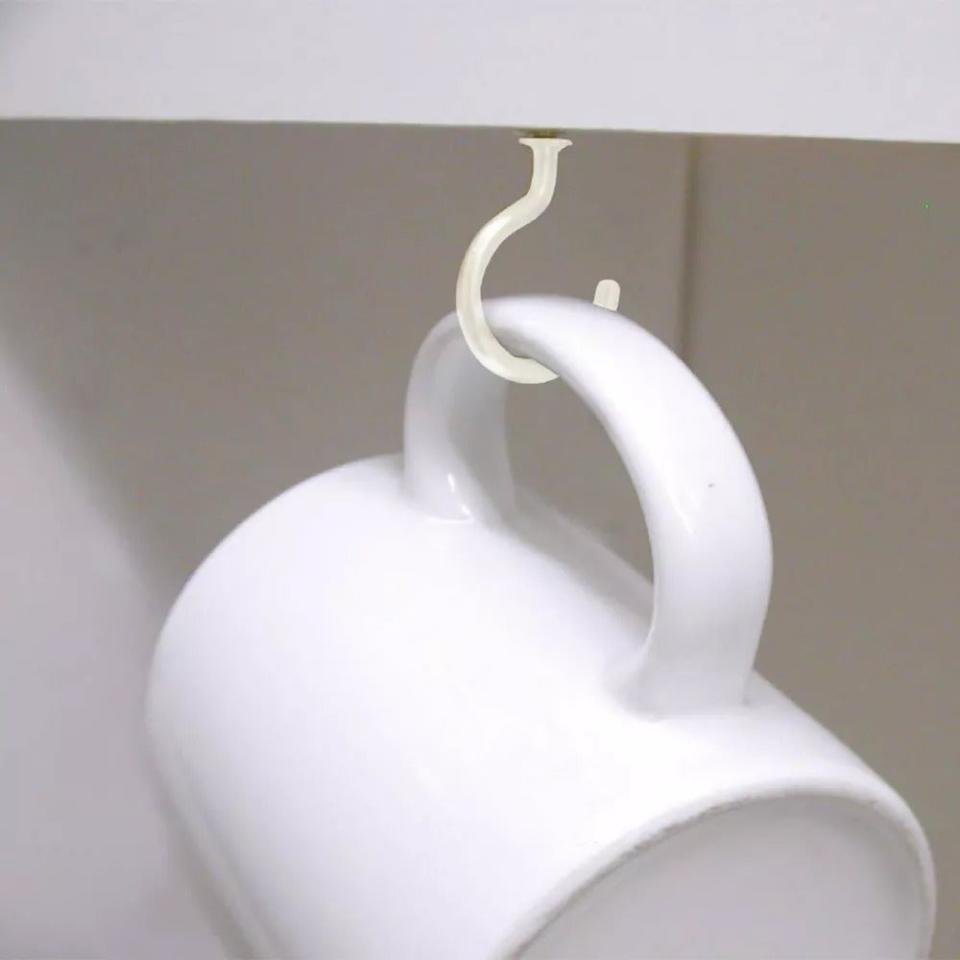 a mug hanging on a hook