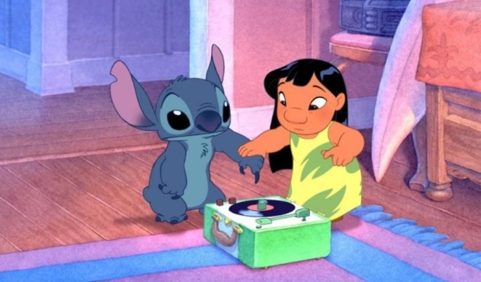 Lilo and Stich playing with a record player