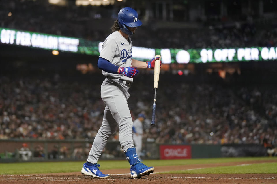 Los Angeles Dodgers' James Outman walks to the dugout after striking out against the San Francisco Giants during the ninth inning of a baseball game in San Francisco, Saturday, Sept. 30, 2023. (AP Photo/Jeff Chiu)